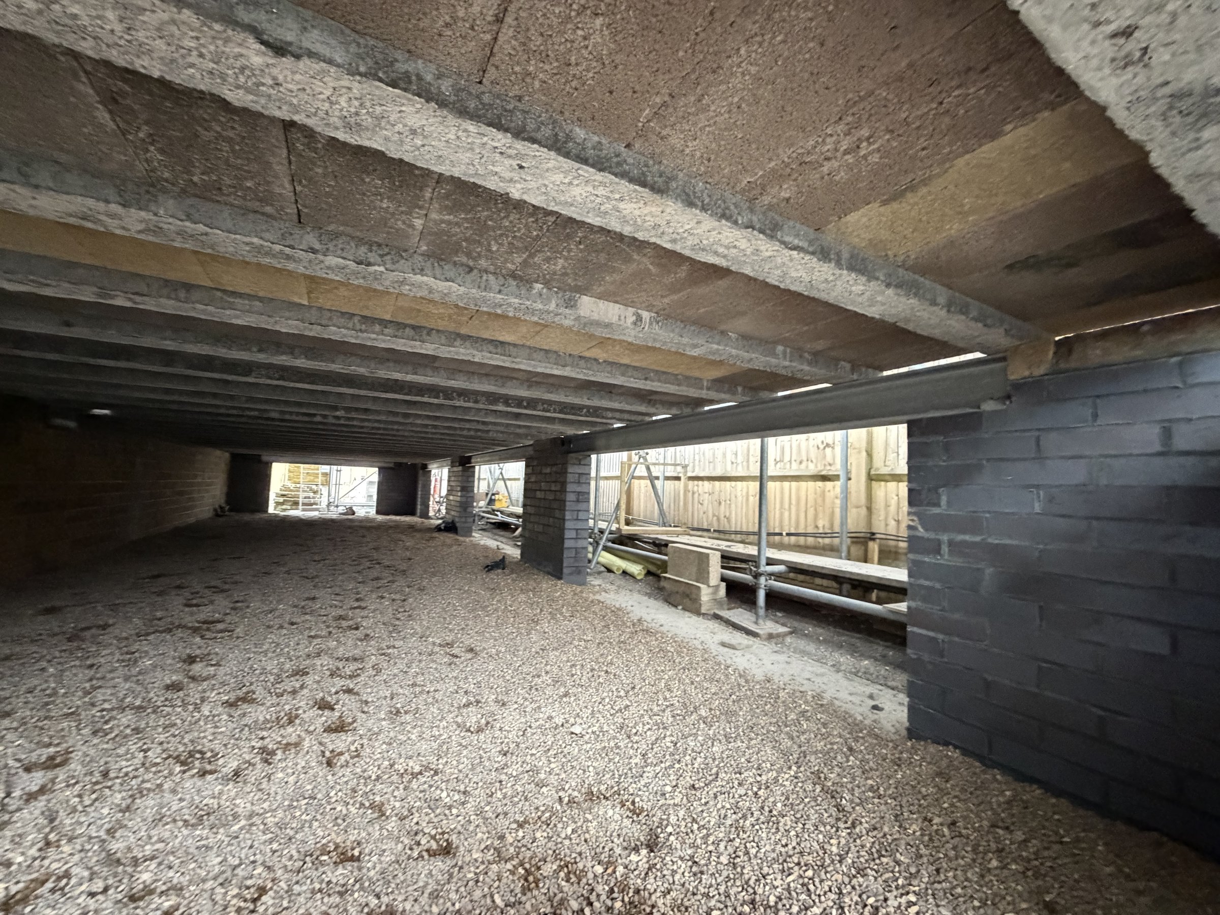 Beam and block floor on a galvanised steel frame over the plinth walls