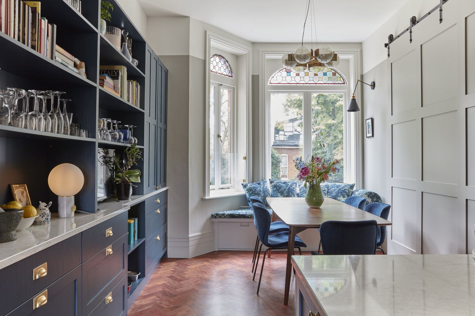 Joinery-lined dining nook with window seat